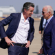 President Joe Biden talks with California Gov. Gavin Newsom as he arrives at Mather Airport on Air Force One Monday, Sept. 13, 2021.